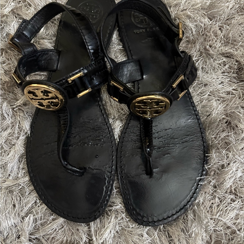 Tory Burch Black Leather Sandals with Gold Emblem
